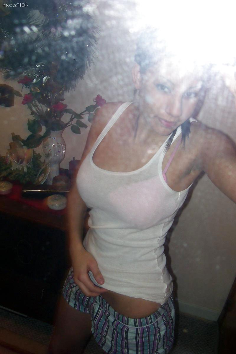 20P Sweet chick in front of a mirror.