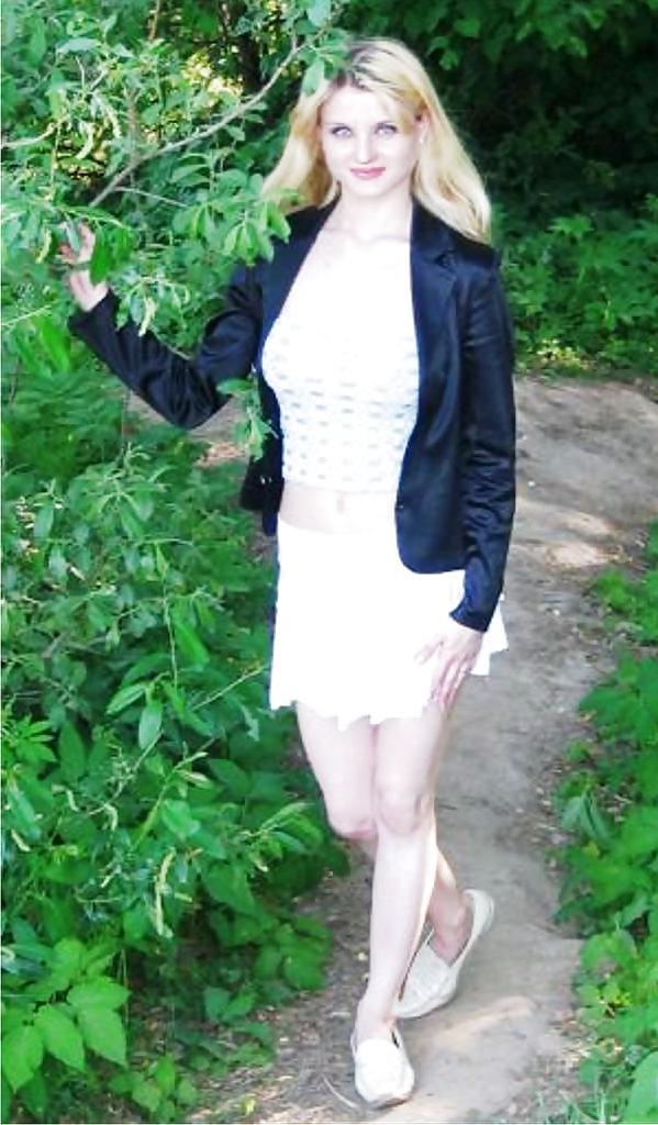 25P Private pictures of a cute teen girl in heels and stockings