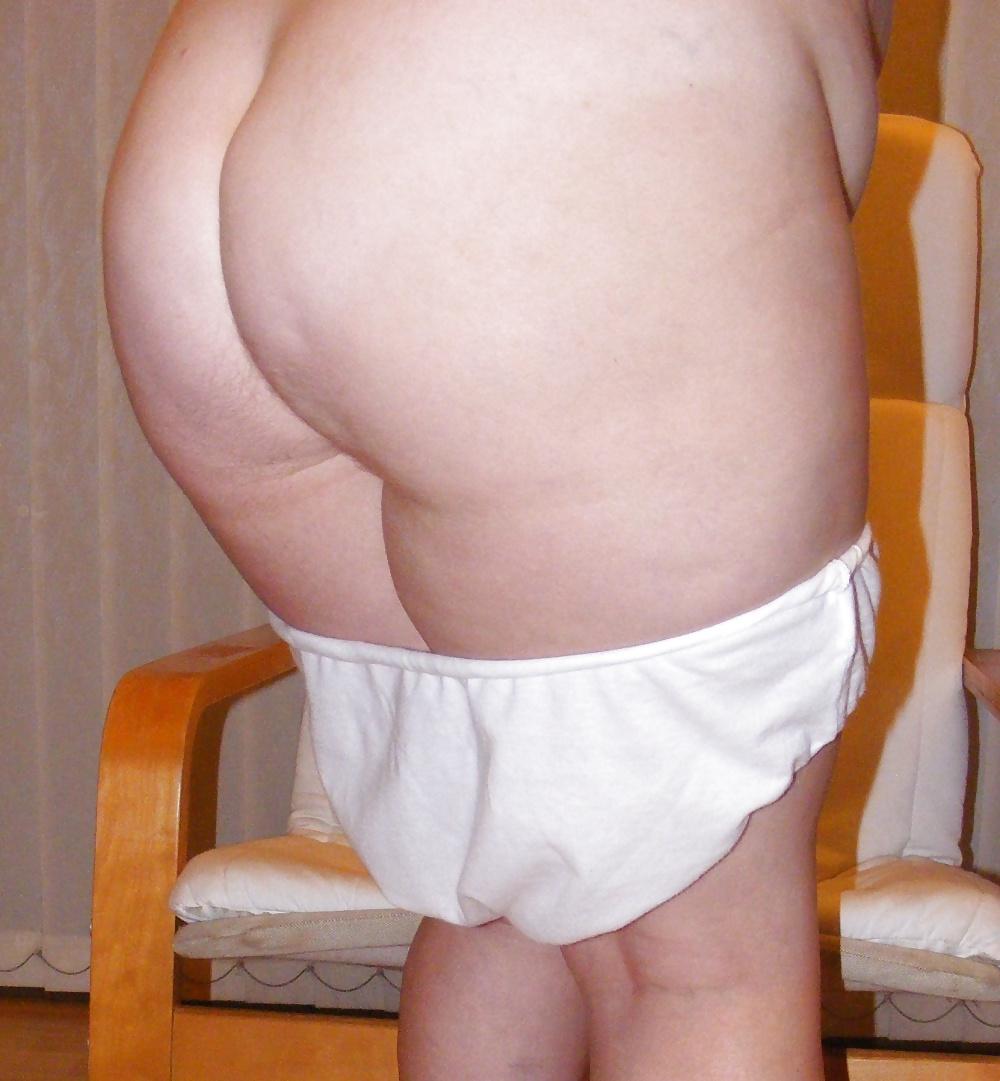 25P Tights, denim skirt, and big white knickers