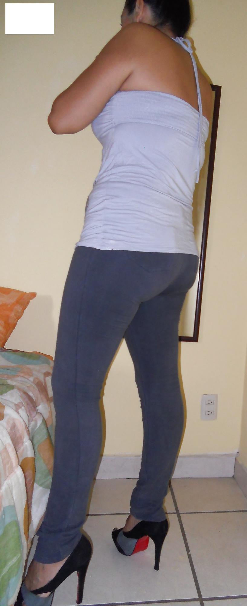 13P Latina strips off  jeans show  thong