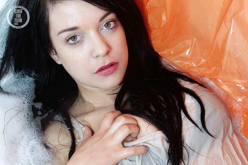 16P Beautiful dark haired amateur girl fingers her pussy