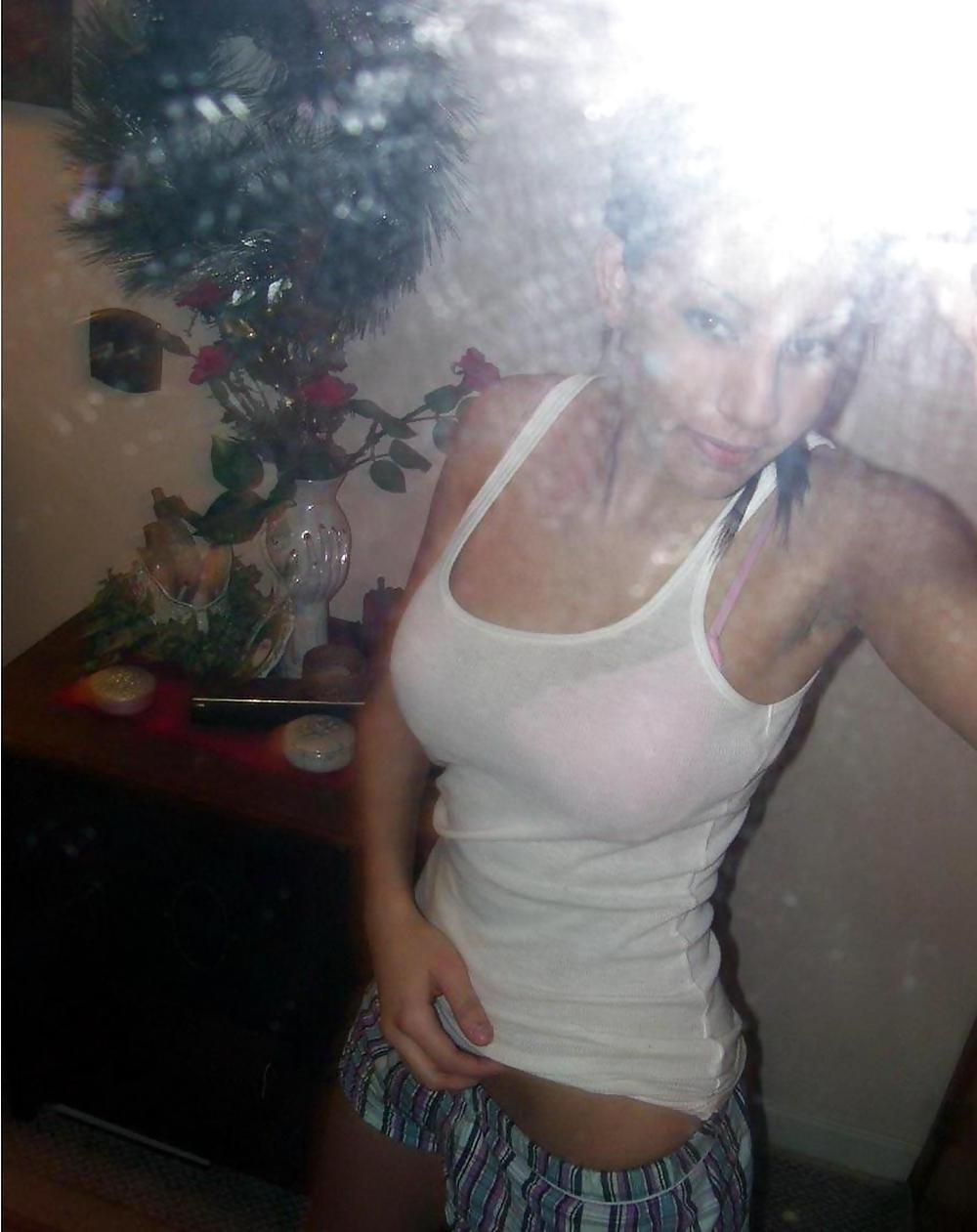 17P Brunette posing in mirror