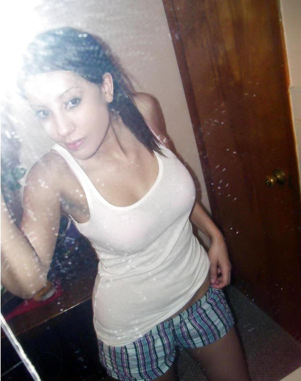 17P Brunette posing in mirror