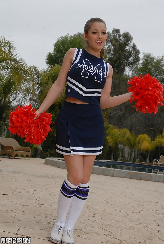 16P Teen cheerleader Dani Daniels pulls up her skirt to toy her gloryhole