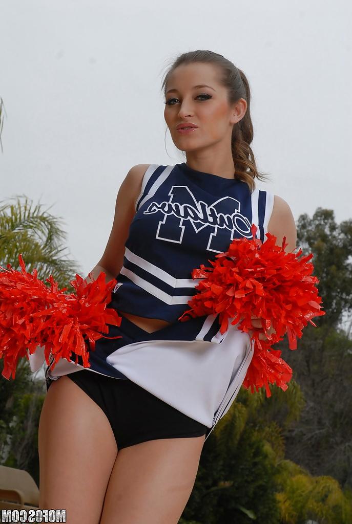 16P Teen cheerleader Dani Daniels pulls up her skirt to toy her gloryhole