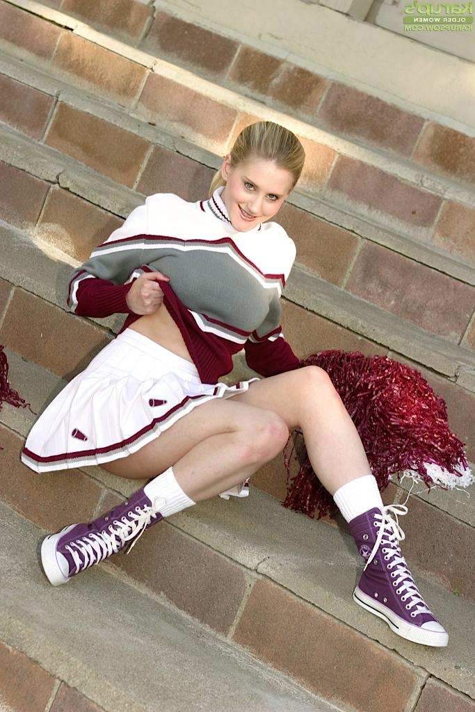16P Cheerleader Anika is demonstrating her pussy without white panties