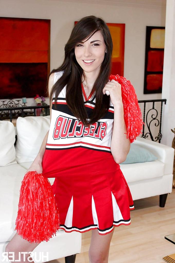 16P Naughty teen girl Emily Grey posing solo in sexy cheerleader uniform