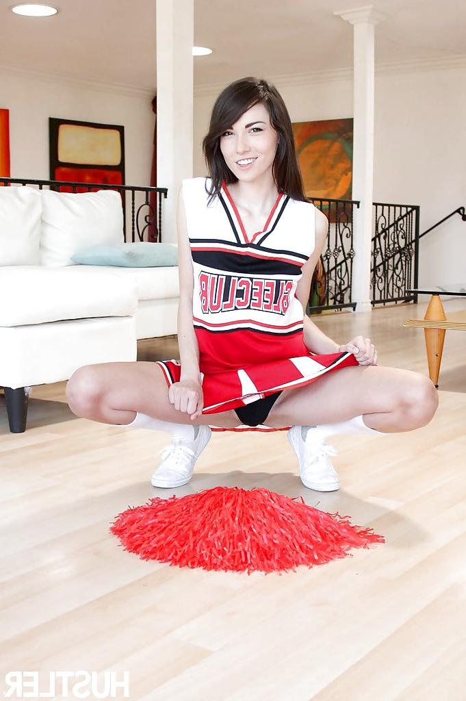 16P Naughty teen girl Emily Grey posing solo in sexy cheerleader uniform