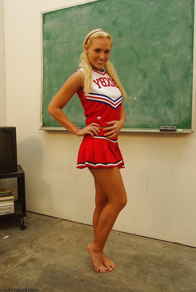 16P Nasty cheerleader Jamey James stripping and exposing her bare feet
