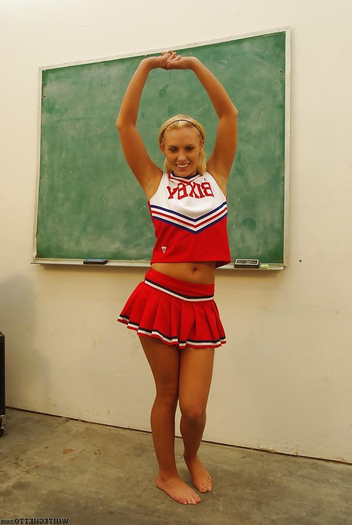 16P Nasty cheerleader Jamey James stripping and exposing her bare feet