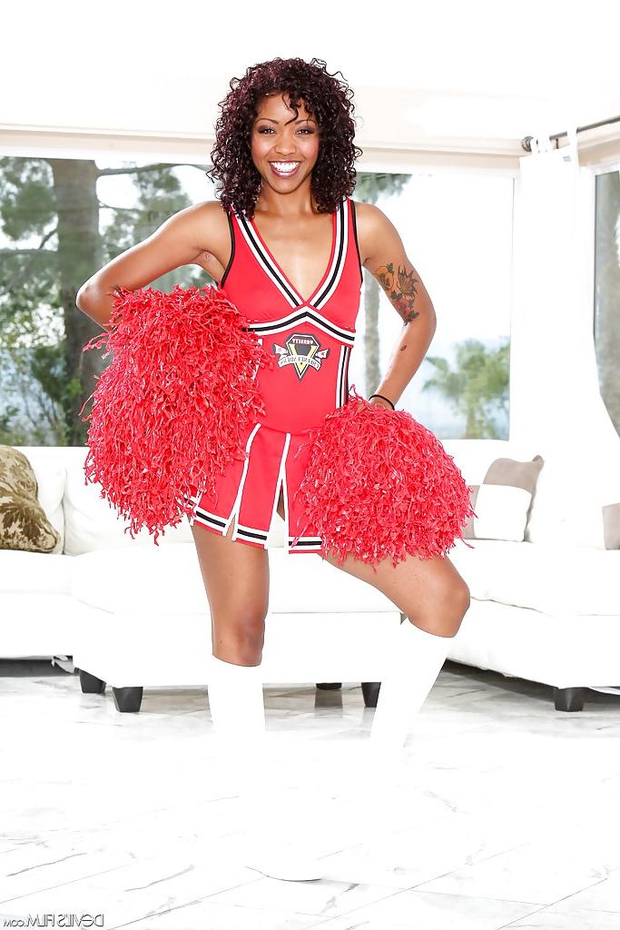 16P Ebony cheerleader Devils Film is showing all of her tattoos
