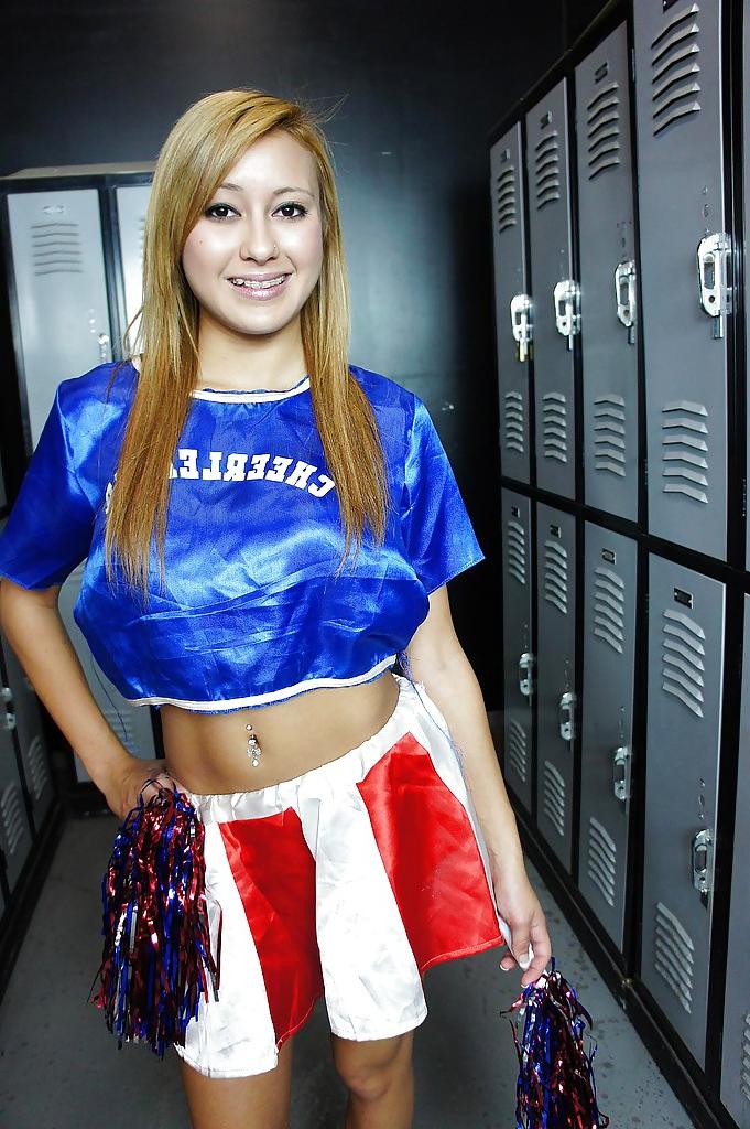 16P Big tit blonde cheerleader Marina is undressing her sexy uniform