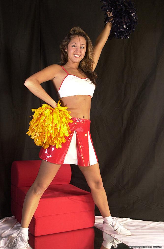 16P Amateur Latina chick Mailia releasing tiny breasts from cheerleader outfit