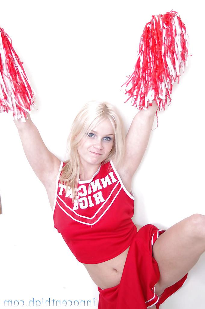 12P Schoolgirl cheerleader Kylee is a blonde babe that is undressing for us