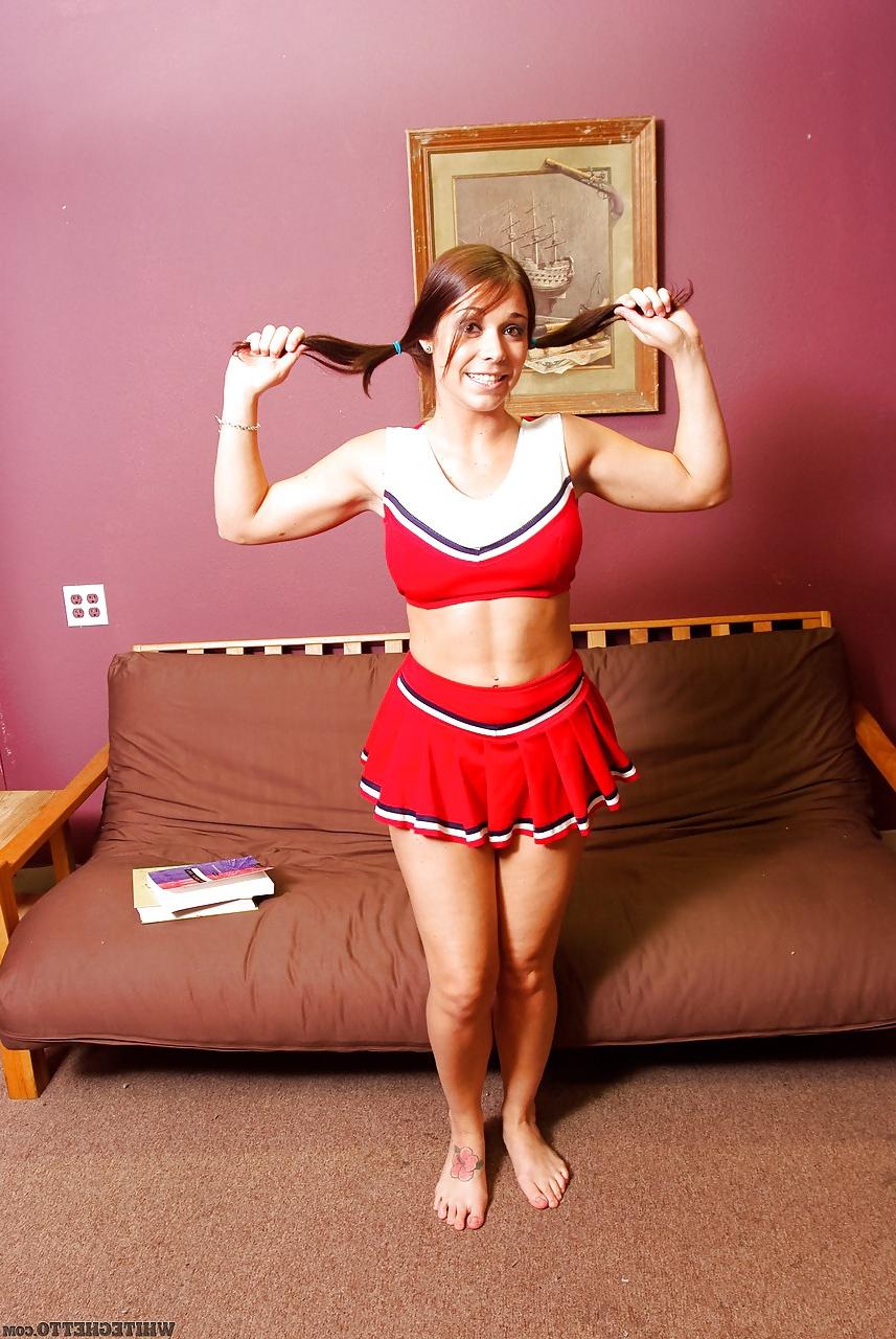 15P Leggy brunette babe Beverly Hills flashing upskirt panties in cheer outfit