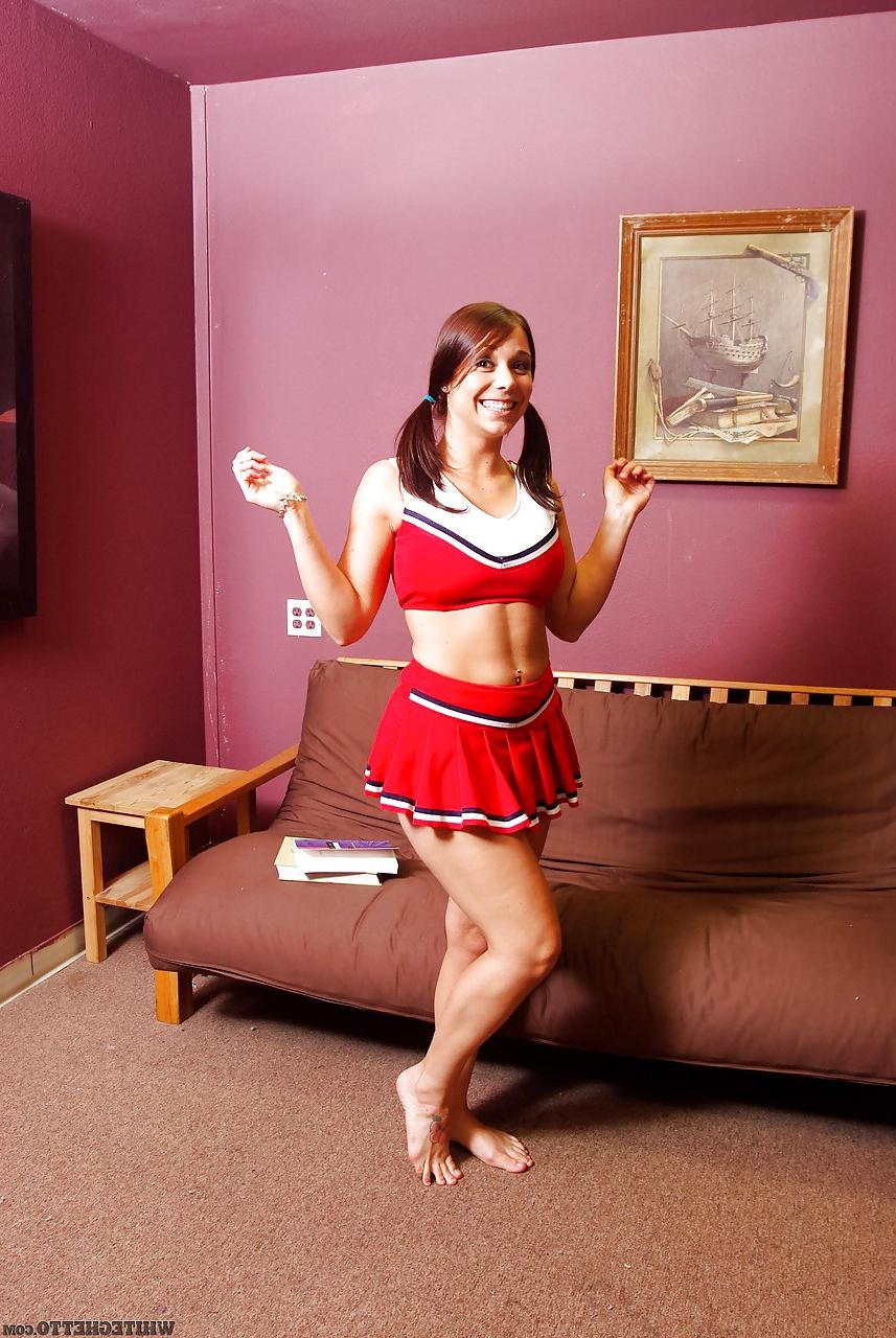 15P Leggy brunette babe Beverly Hills flashing upskirt panties in cheer outfit
