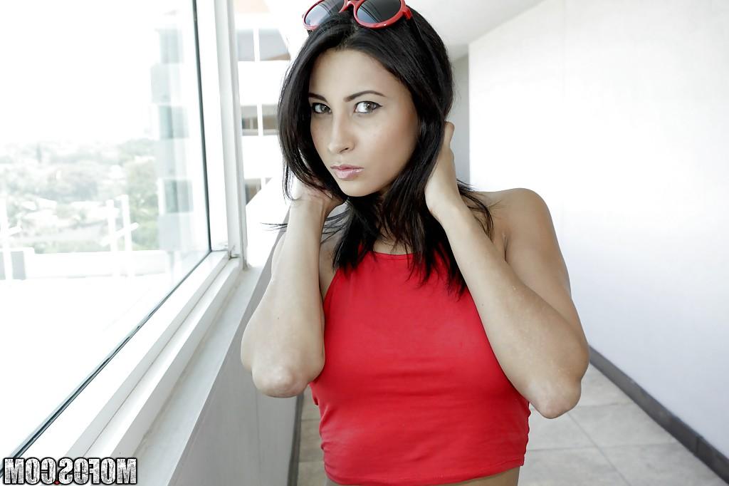 16P Slender Latina babe Jade Jantzen is undressing her tight jeans shorts