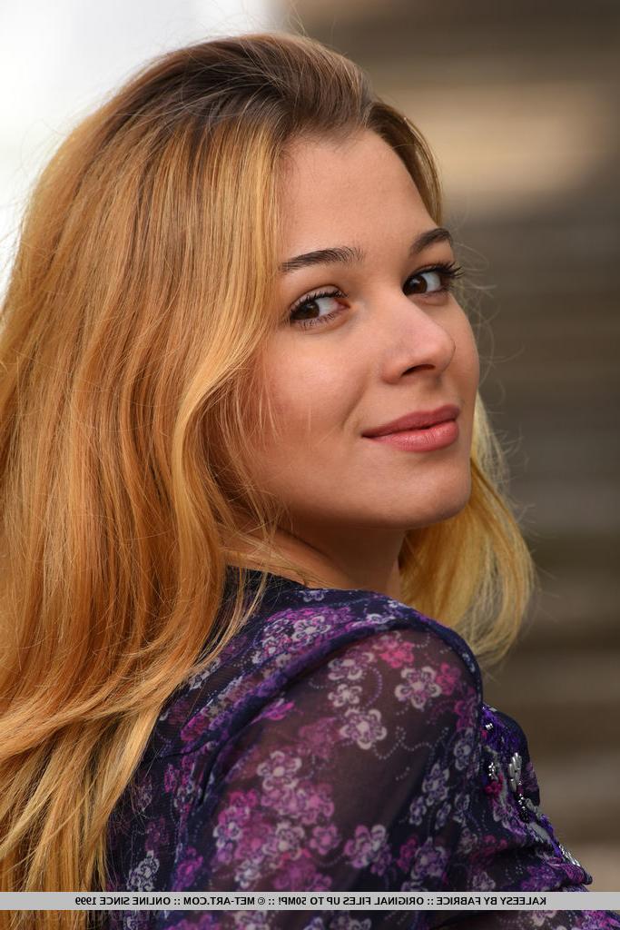 18P Teen babe with tiny boobs freeing phat ass from shorts during glam shoot