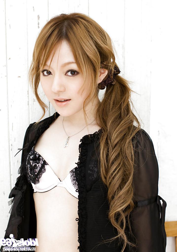 15P Stunning asian babe with tiny tits Ria Sakurai taking off her lingerie