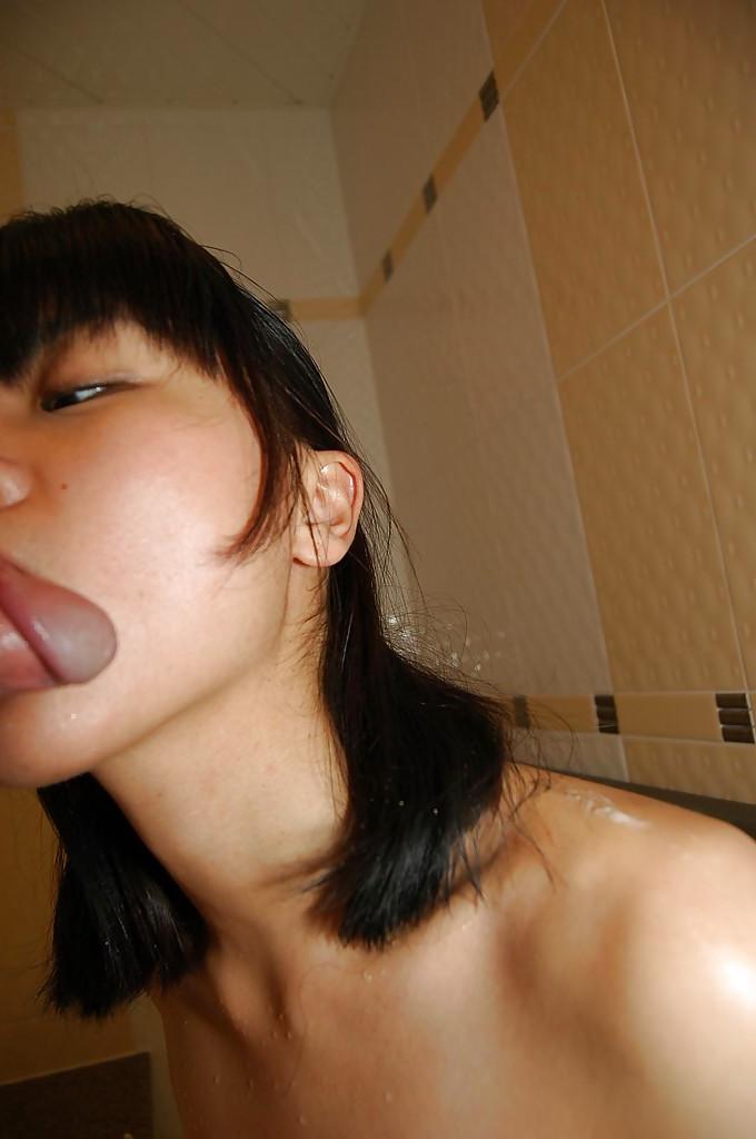 16P Asian cutie Midori Kimishima gives a sensual blowjob in the bathroom