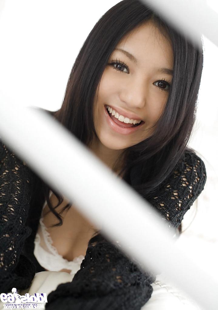 15P Pretty asian teenage vixen Aino Kishi uncovering her tiny curves