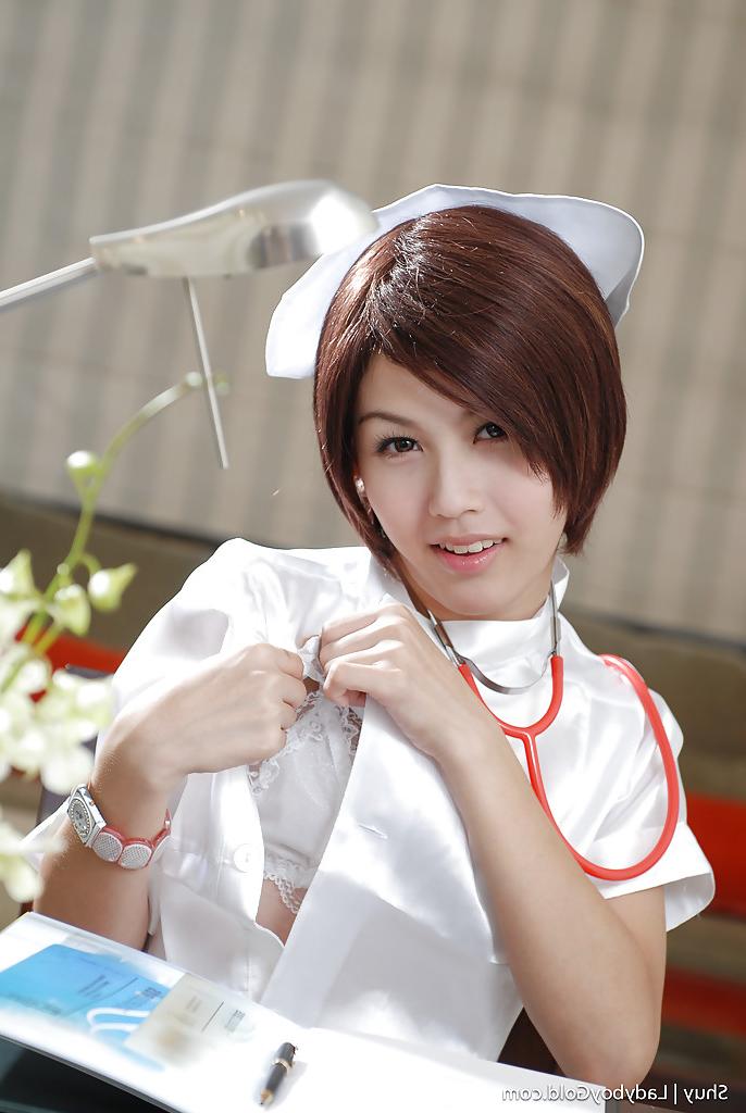 16P Cute skinny Thai shemale Shuy jerking off in stockings and lingerie