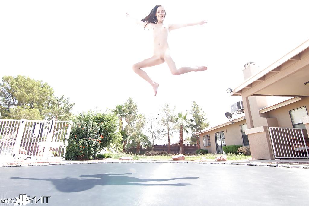 12P Leggy solo girl Lola Hunter poses outdoors beside swimming pool in bikini