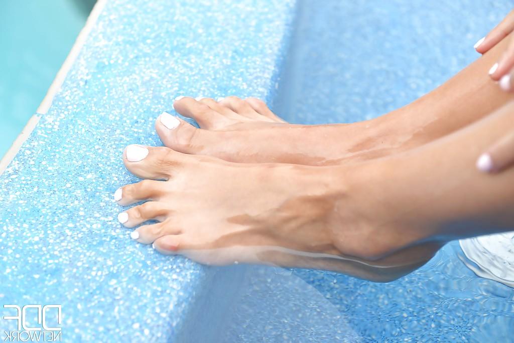 16P Leggy dark haired babe Alexa Tomas toying outdoors by pool in barefeet