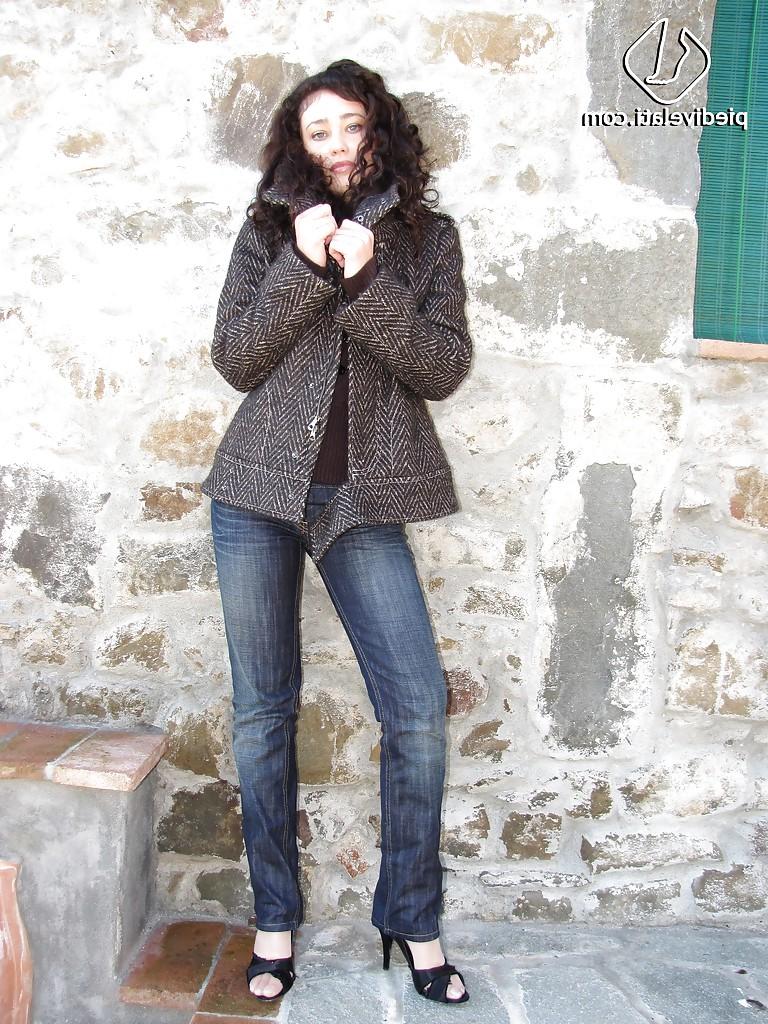 16P Brunette girl Erica adores to show her stunning legs and feet