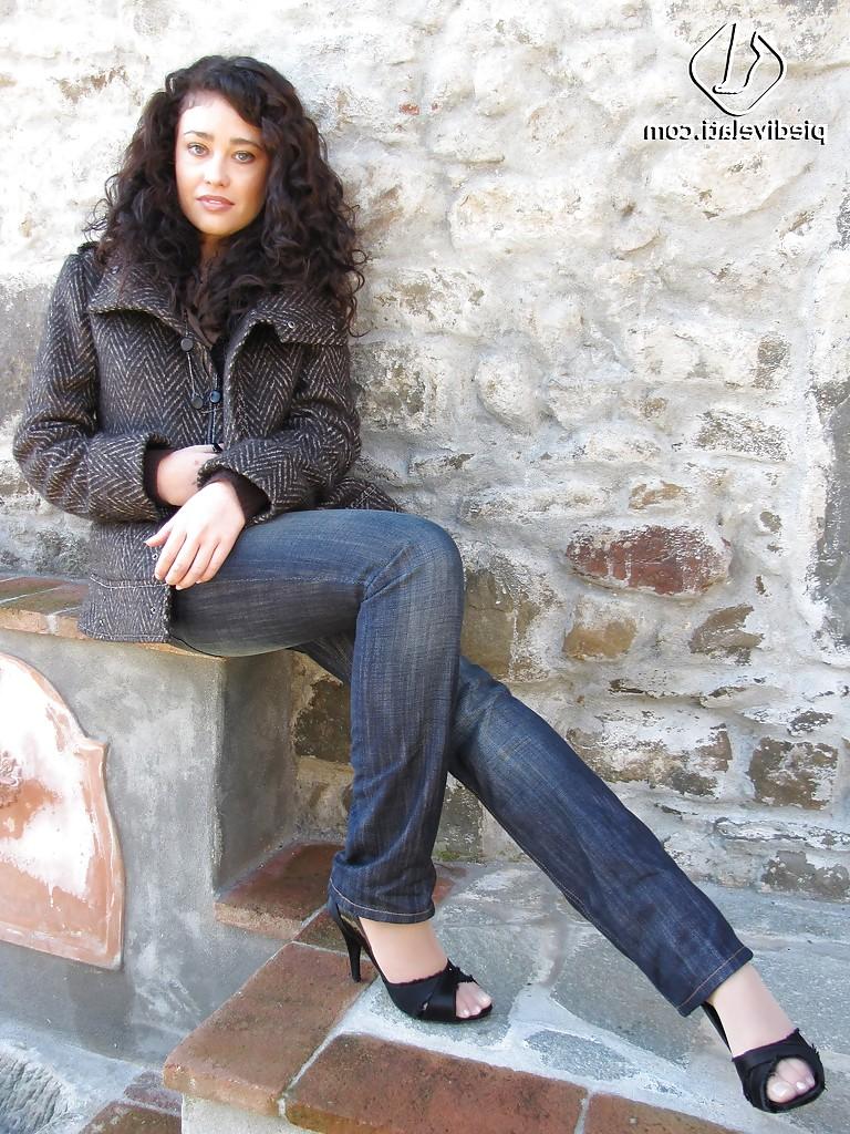 16P Brunette girl Erica adores to show her stunning legs and feet