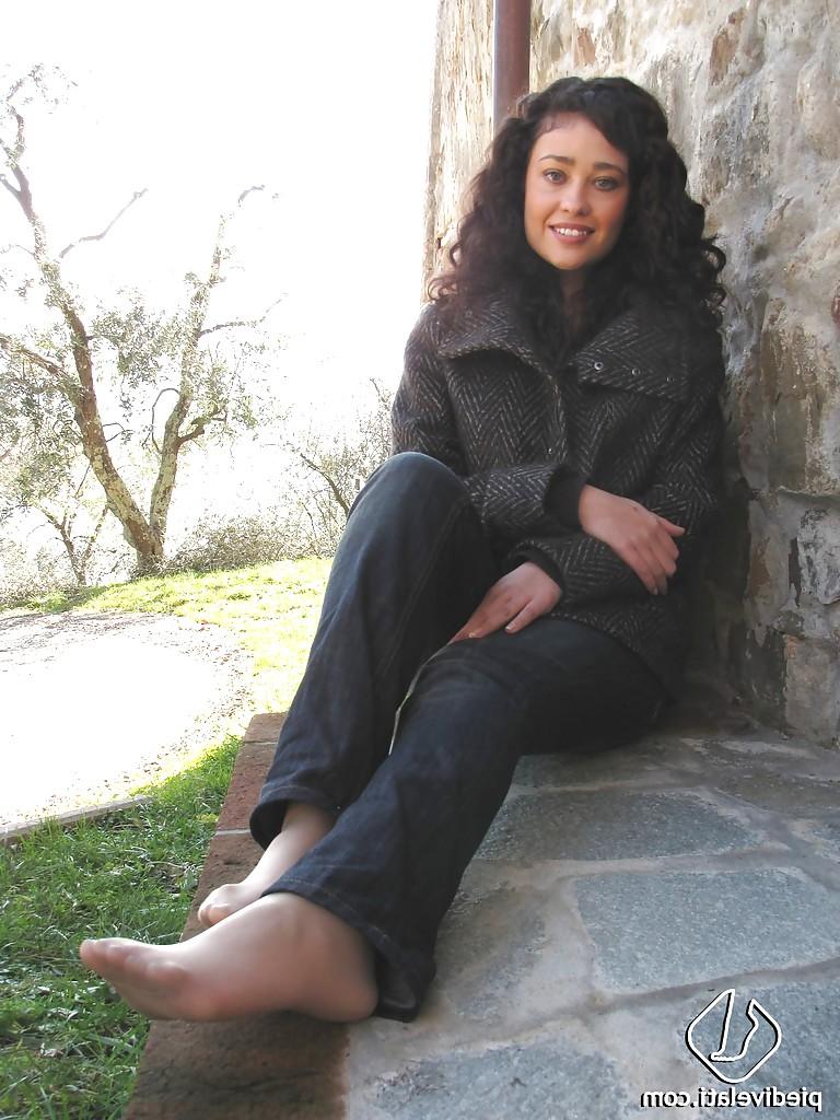 16P Brunette girl Erica adores to show her stunning legs and feet