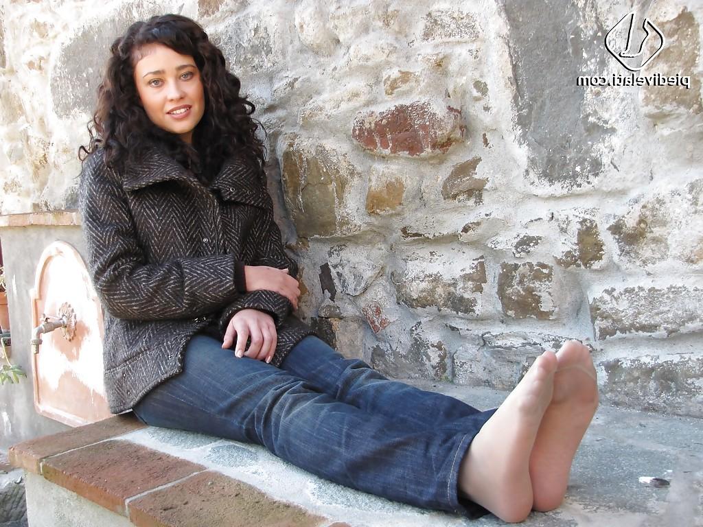 16P Brunette girl Erica adores to show her stunning legs and feet