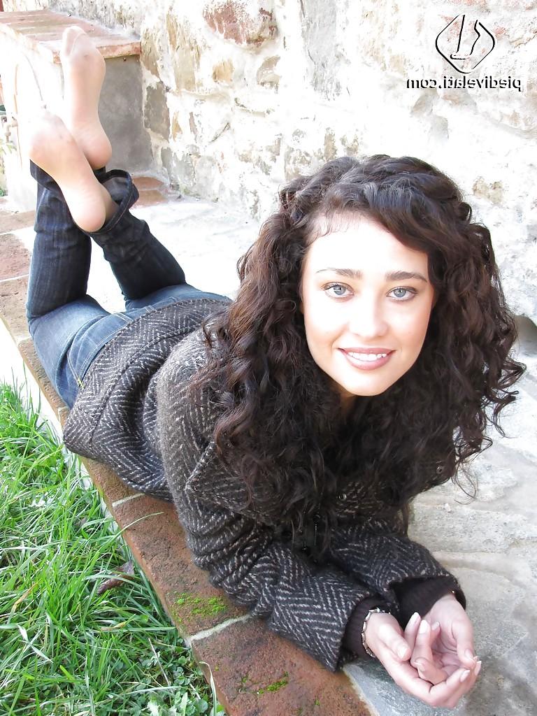 16P Brunette girl Erica adores to show her stunning legs and feet
