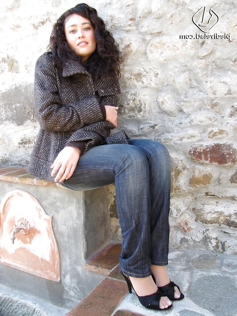 16P Brunette girl Erica adores to show her stunning legs and feet