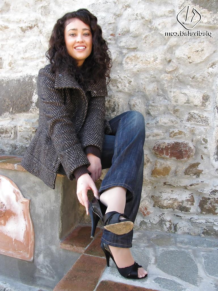 16P Brunette girl Erica adores to show her stunning legs and feet