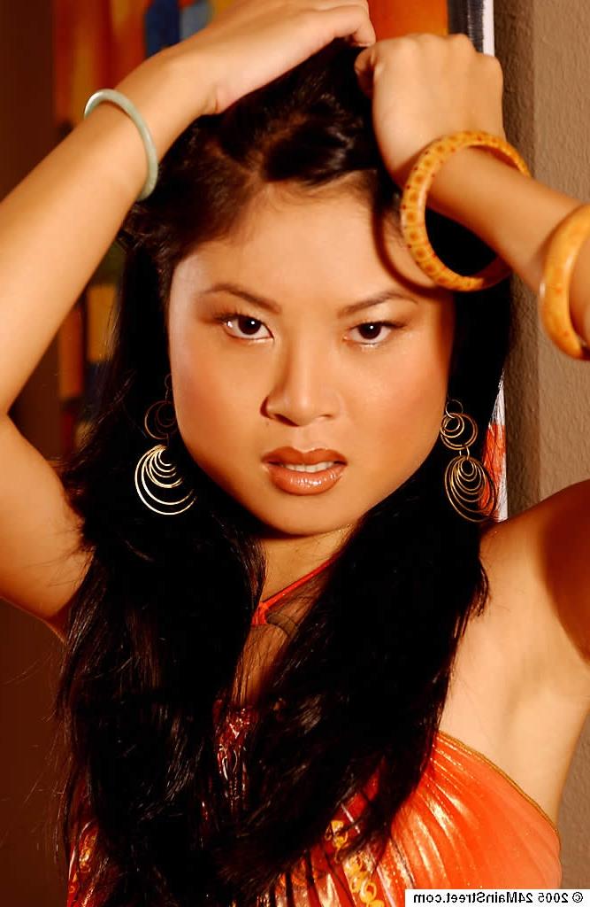 16P Asian pornstar Thi Quach demonstrates her tight ass in a bikini