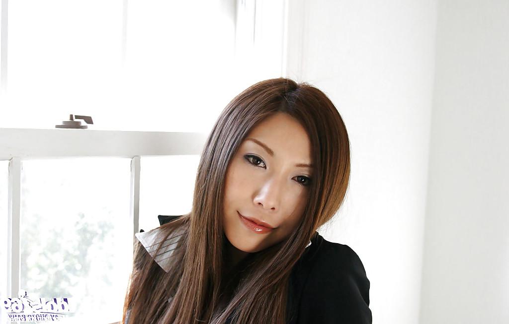 15P Graceful asian girl in jeans Seira Narumi slowly stripping