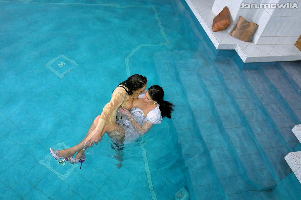 16P Fully clothed european vixens have some lesbian fun in the pool