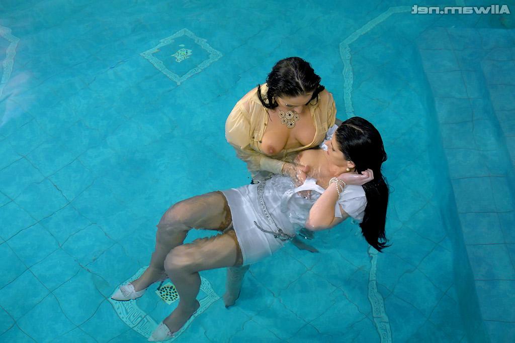 16P Fully clothed european vixens have some lesbian fun in the pool