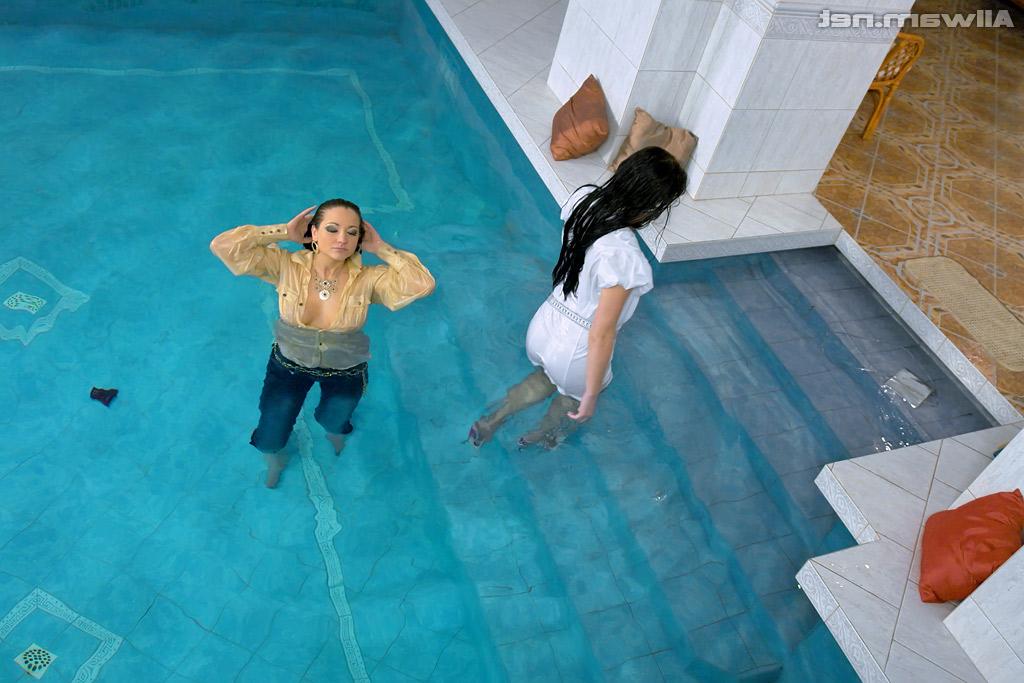 16P Fully clothed european vixens have some lesbian fun in the pool