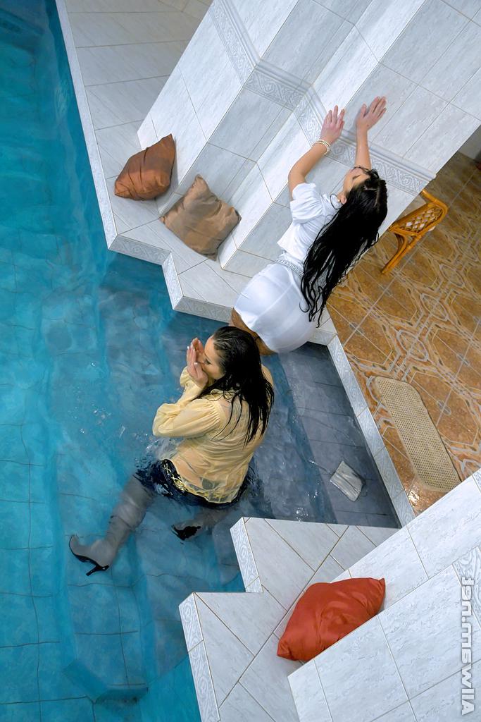 16P Fully clothed european vixens have some lesbian fun in the pool