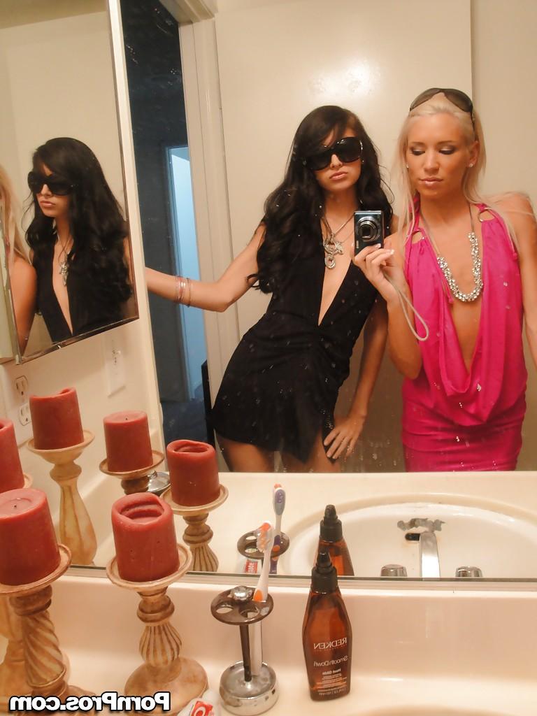 12P Skinny girls Kacey and Zoey showing off teenie tits while taking mirror selfie