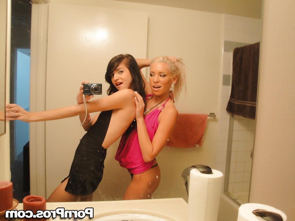 12P Skinny girls Kacey and Zoey showing off teenie tits while taking mirror selfie