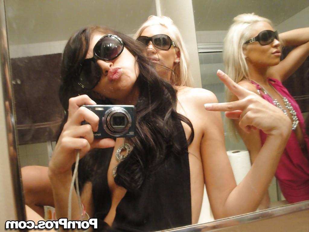12P Skinny girls Kacey and Zoey showing off teenie tits while taking mirror selfie