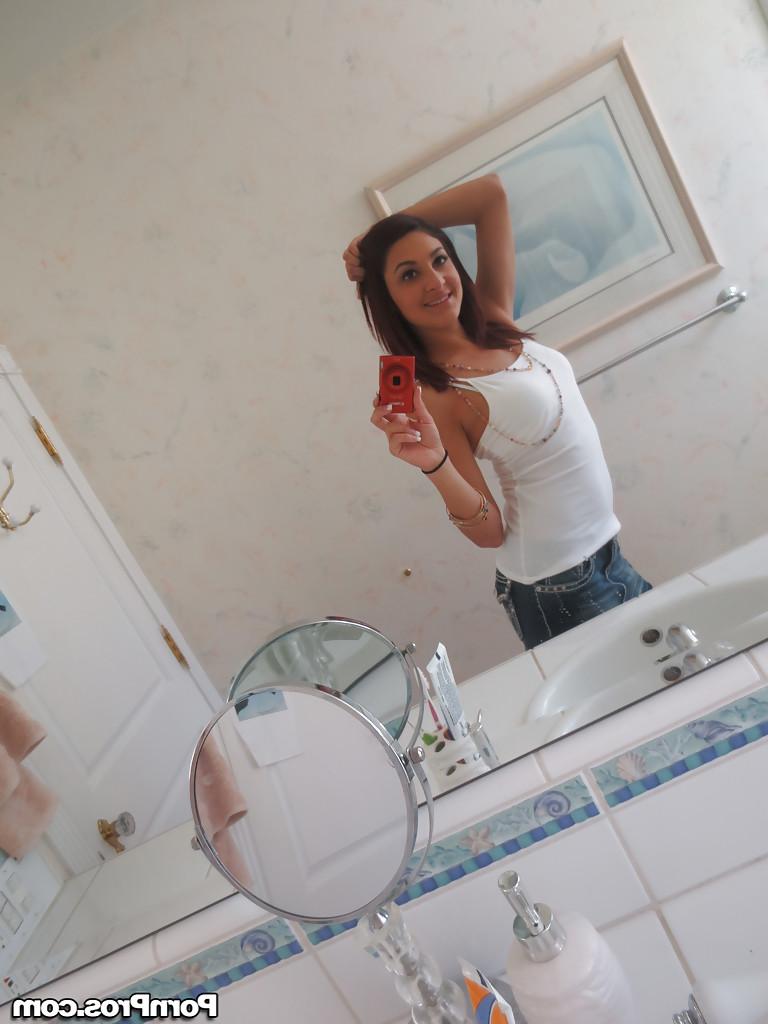 16P Nasty brunette slut Nikka taking couple of selfies in the bathroom