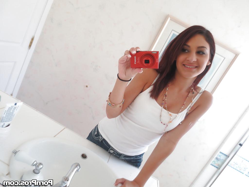 16P Nasty brunette slut Nikka taking couple of selfies in the bathroom