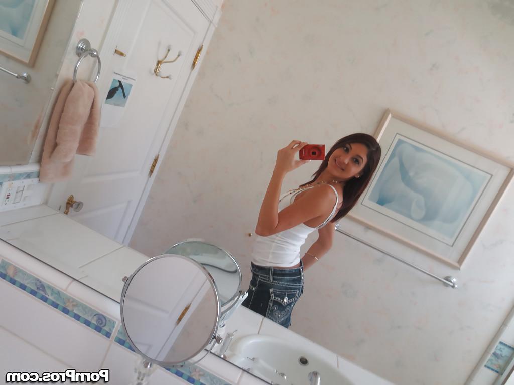 16P Nasty brunette slut Nikka taking couple of selfies in the bathroom