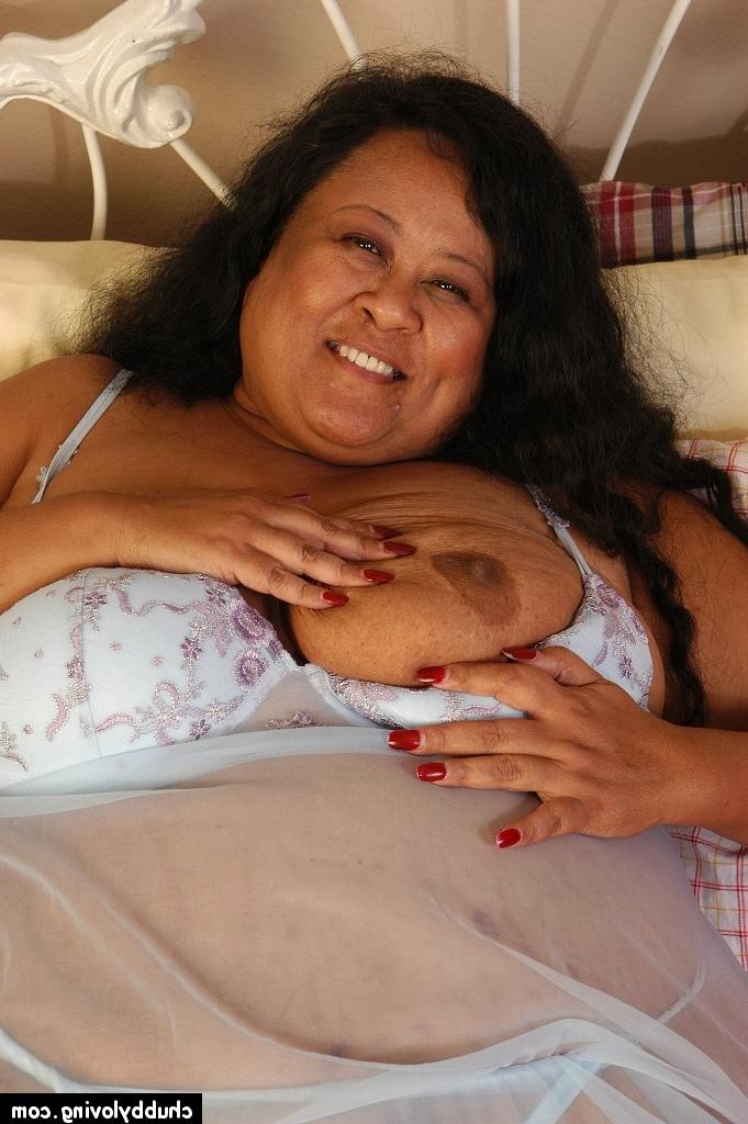 16P SSBBW Debrina lets fat tits loose from lingerie for nipple licking
