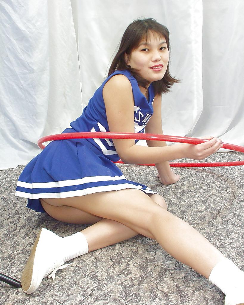 16P Naughty thai cheerleader flashing her fanny and inviting pussy