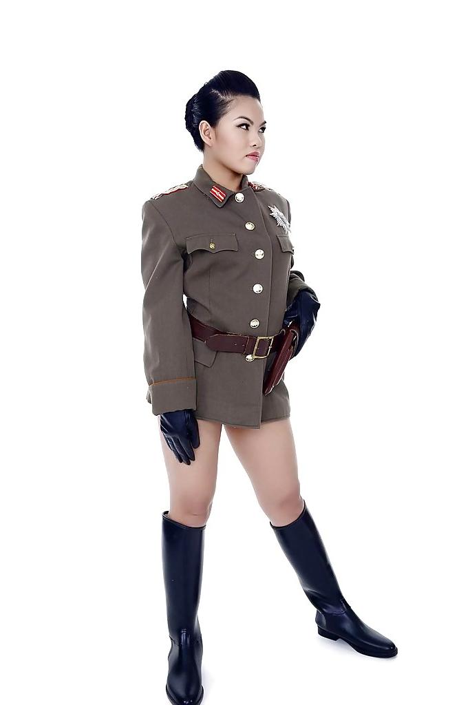 16P Oriental pornstar Cindy Starfall posing solo in military garb